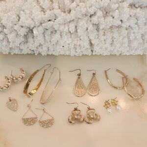 7 Pairs Of Earrings And A Heart Pendant For One Low Price!